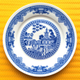 Illustration for article titled Sci-fi Chinese porcelain plates show giant robots and alien invasions